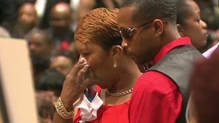 The family of Michael Brown walks into his funeral service [upl. by Faxun]