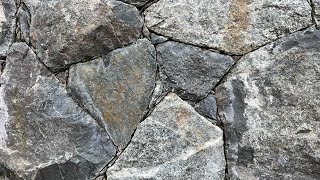 Secrets to creating a beautiful NATURAL STONE WALL Insights from a real stonemason [upl. by Sension]