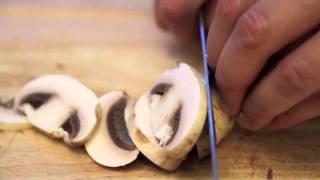 Knife Skills How To Slice Mushrooms [upl. by Yvor]