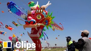 China’s annual kite festival takes off with 280metrelong ‘dragon’ in the sky [upl. by Shue]