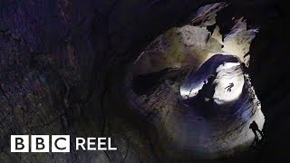 The daring journey inside the worlds deepest cave  BBC REEL [upl. by Ahsenot]