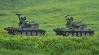 Japans Mitsubishi Type 87 selfpropelled antiaircraft gun Oerlikon 35 mm twin cannon Guntank JGSDF [upl. by Ram175]