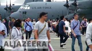 Japan Thousands visit US air base to show support against North Korea [upl. by Yatnuhs790]