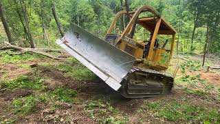 John Deere Dozer making logging roads G660 first tree [upl. by Borries614]